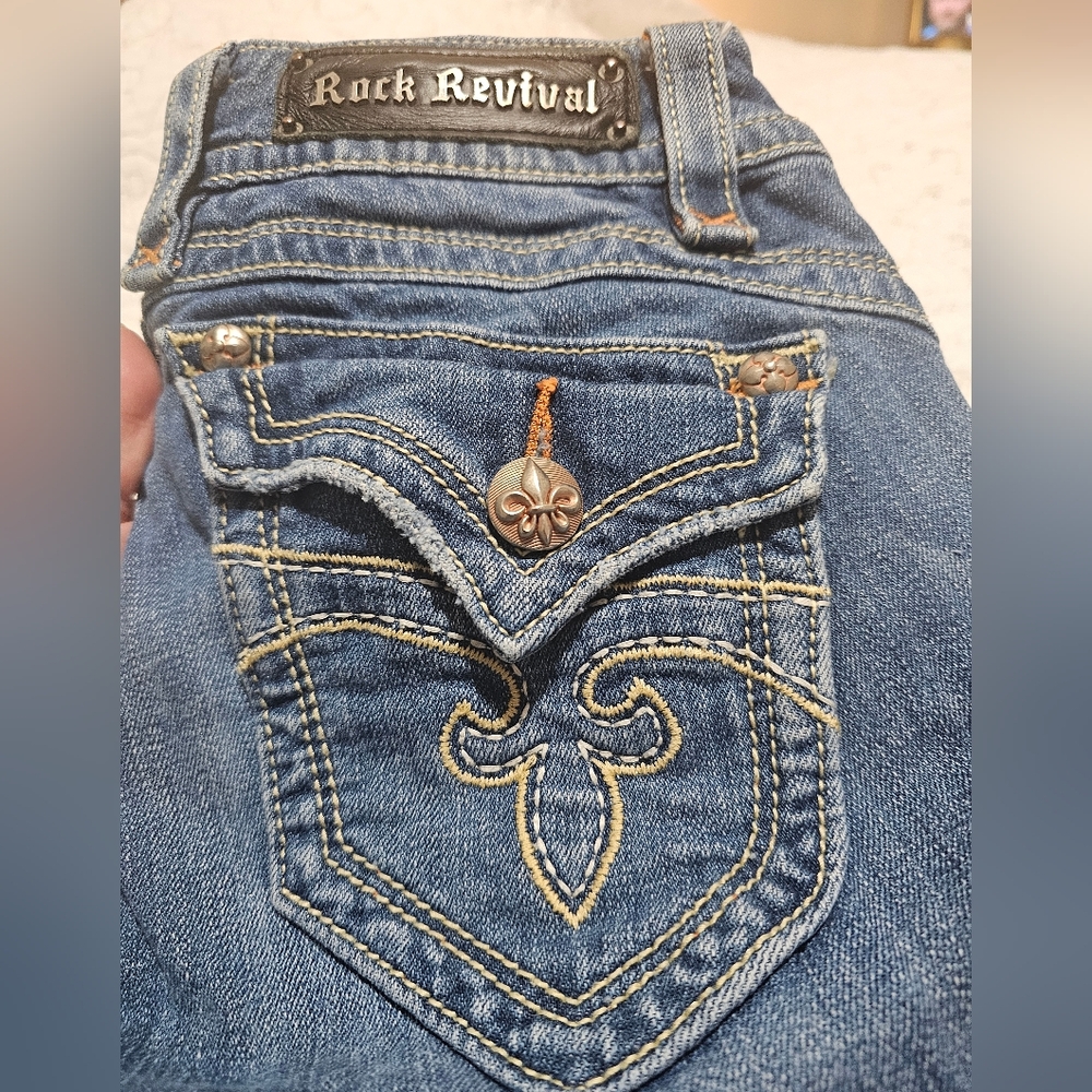 Rock Revival Blue Jeans with Fleur-de-Lis Stitching